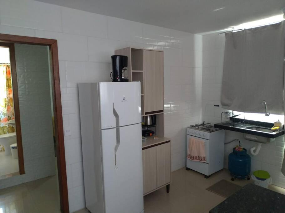 Casa agradável em Camboriú com estacionamento no pátio Vila Exterior foto